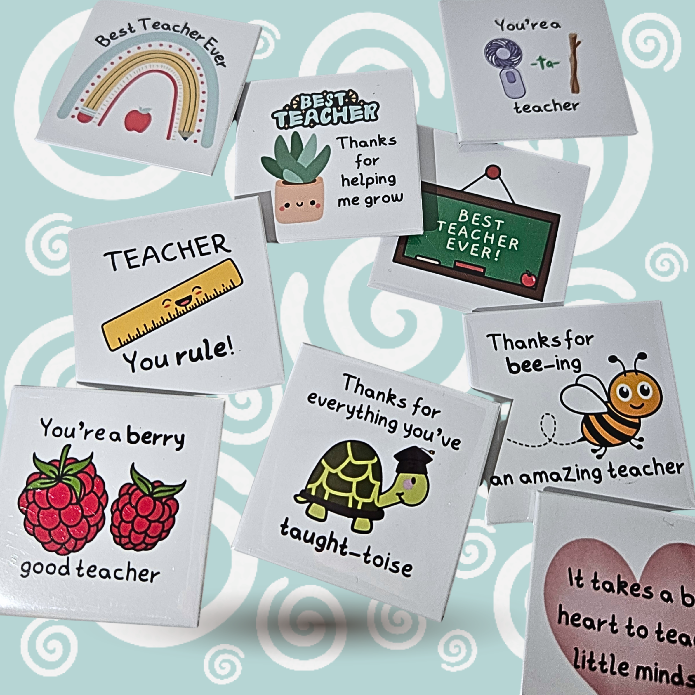 collection of magnets displaying colourful teacher slogans  on green swirly background