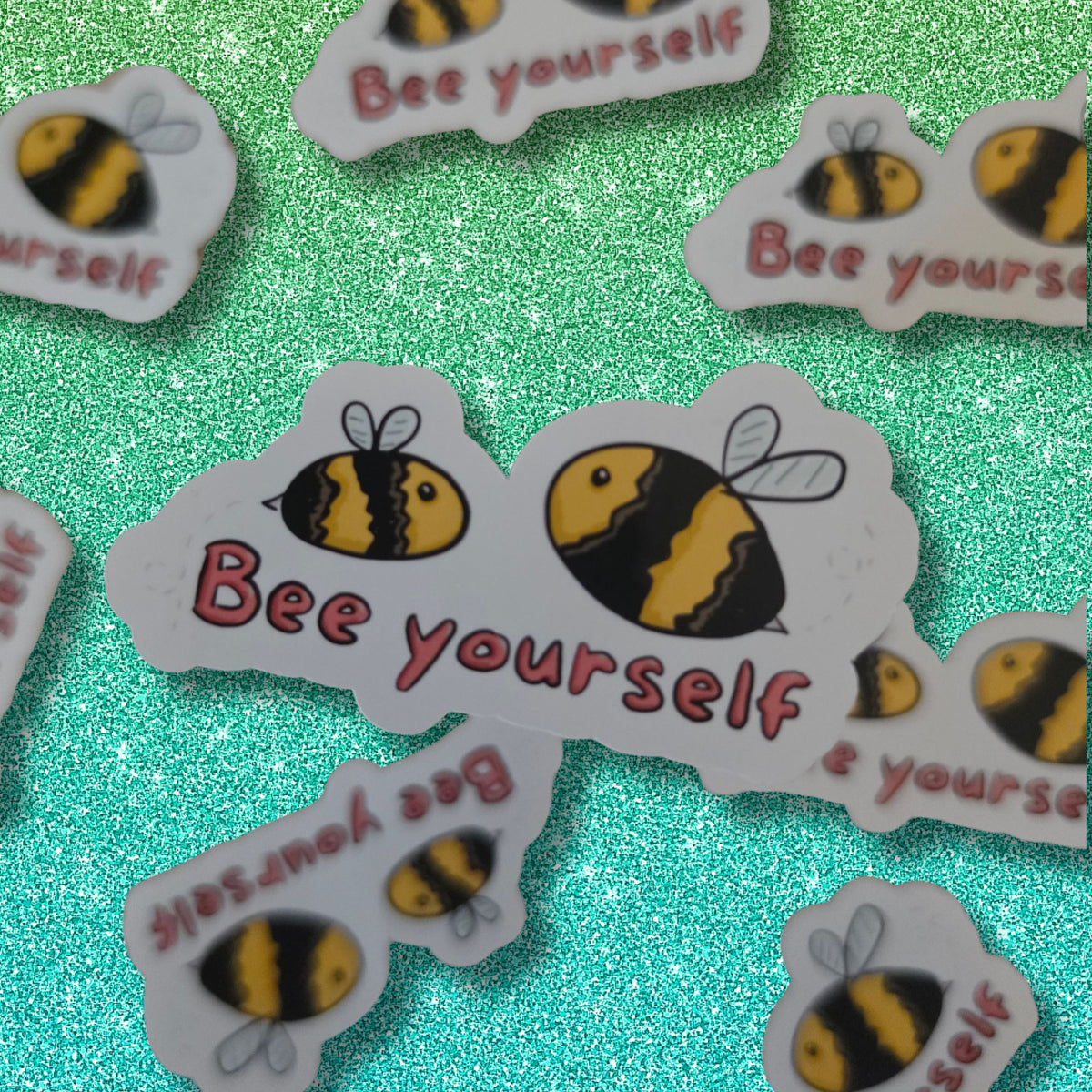 bumblebee die cut sticke4rs on a glittery background