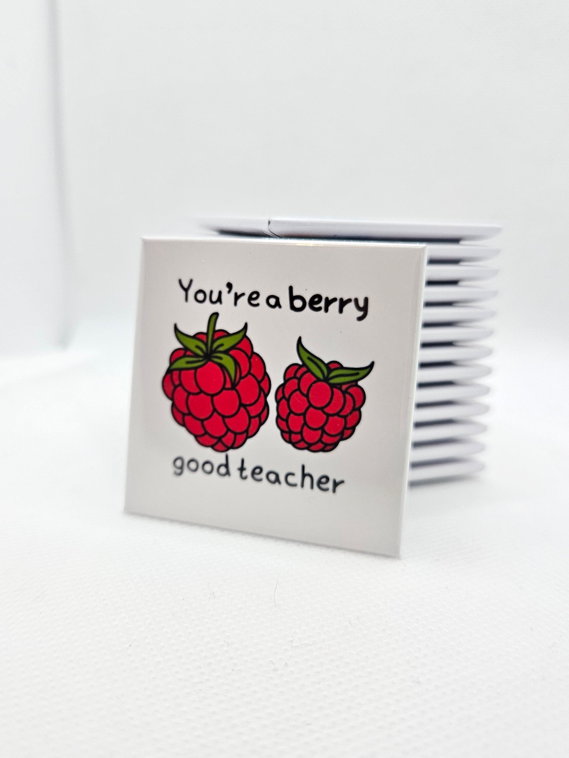 white background with red raspberries and words you're a berry good teacher
