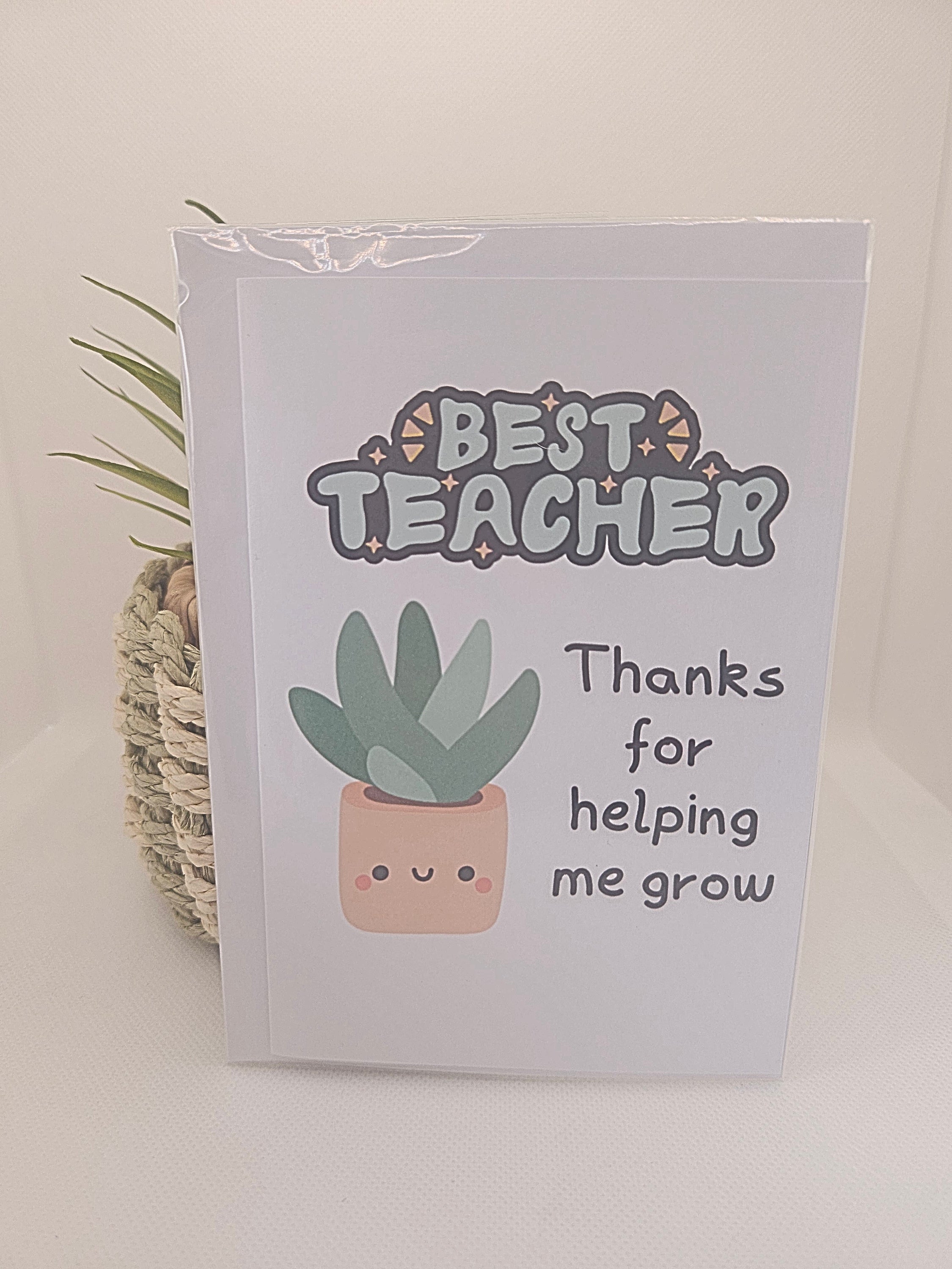 Card with 'Best Teacher' text and a plant illustration on a light background
