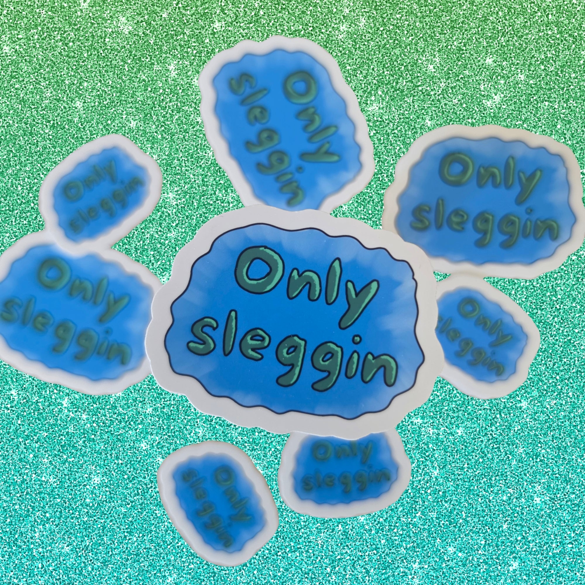 A set of die-cut stickers featuring the phrase 'Only sleggin' in a stylized font, arranged on a sparkling green glitter background.