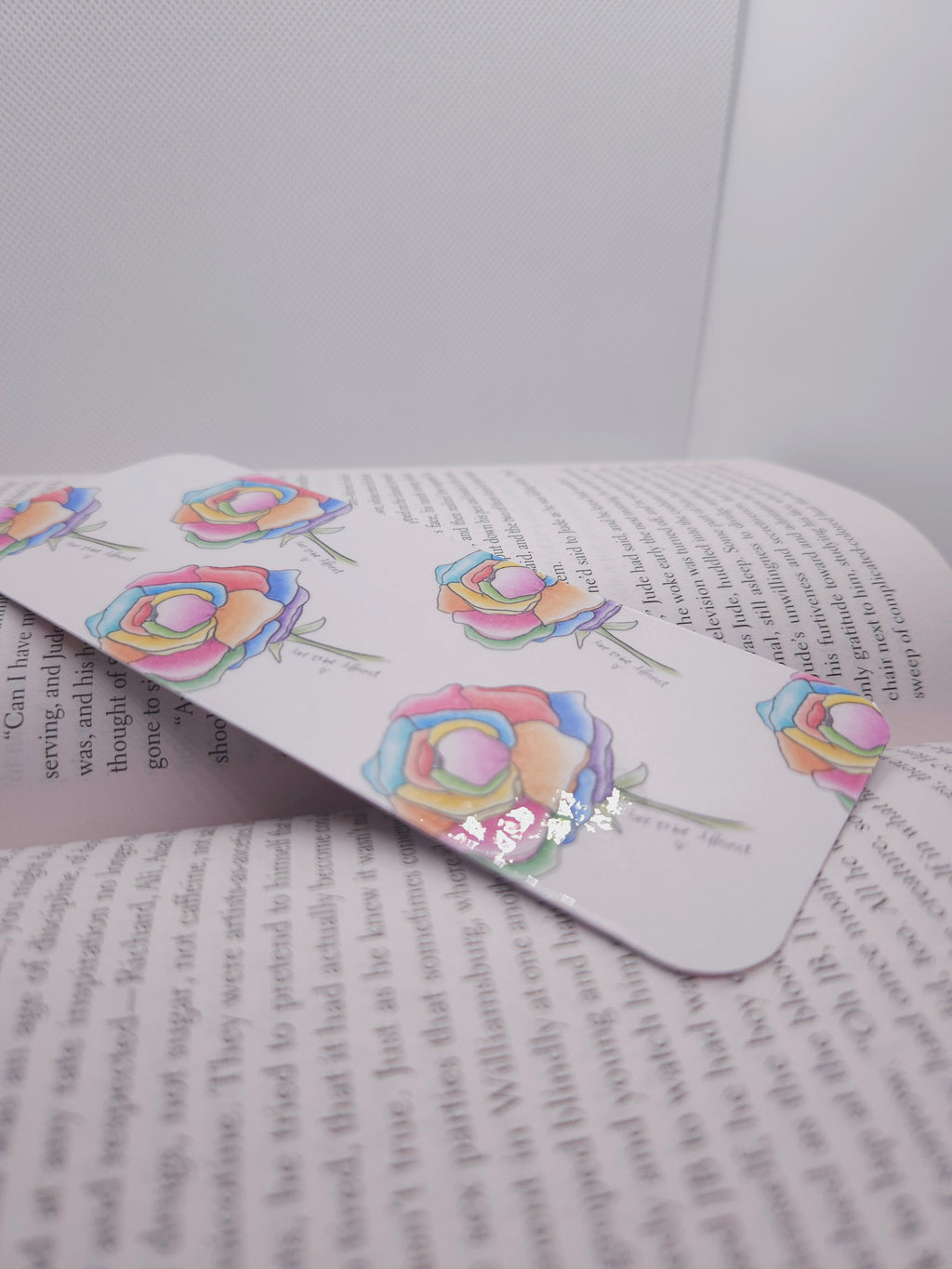 handmade bookmark with colorful designs on an open book
