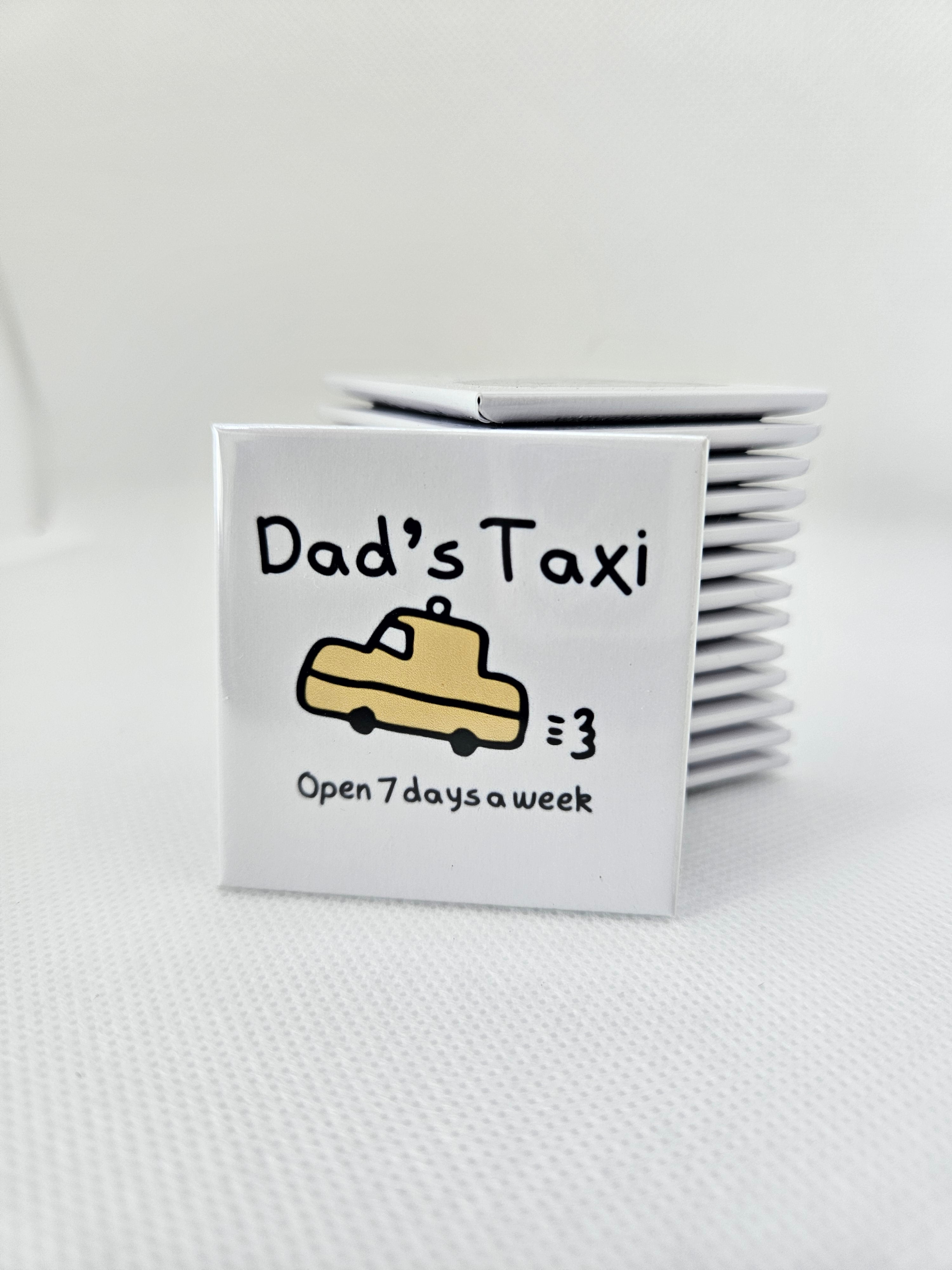 magnets with 'Dad's Taxi' design on a white background