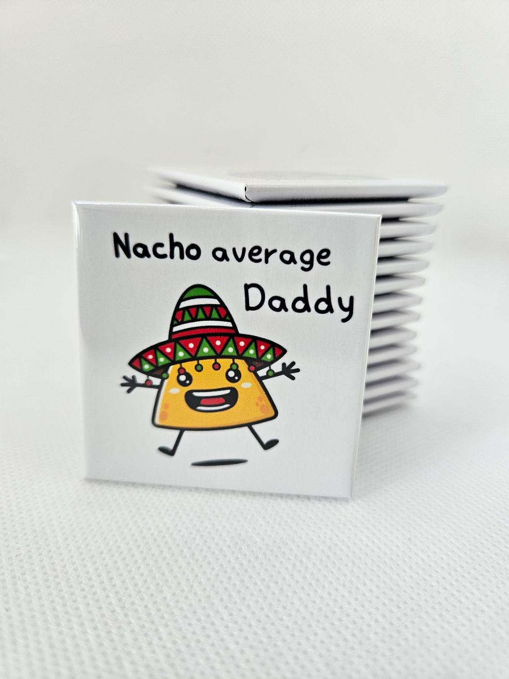 magnet with a cartoon taco character and text on a white background