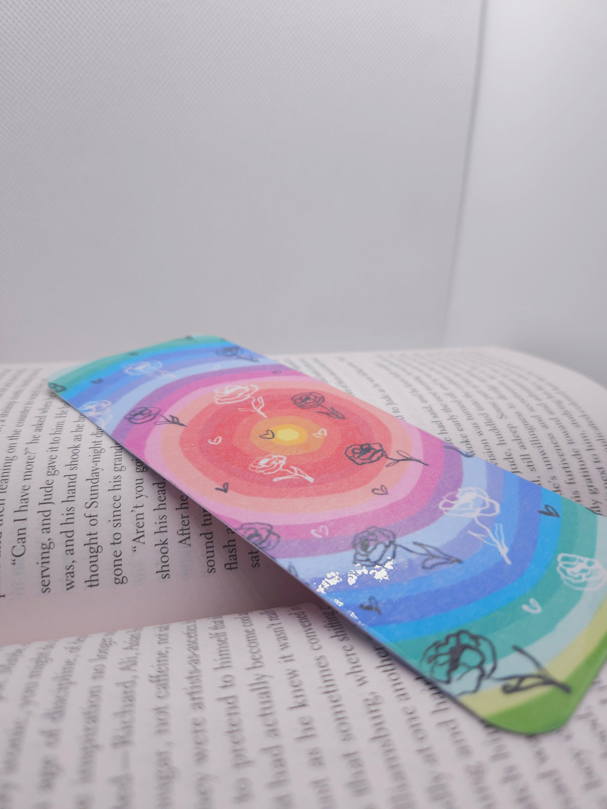 Colorful bookmark on an open book with text