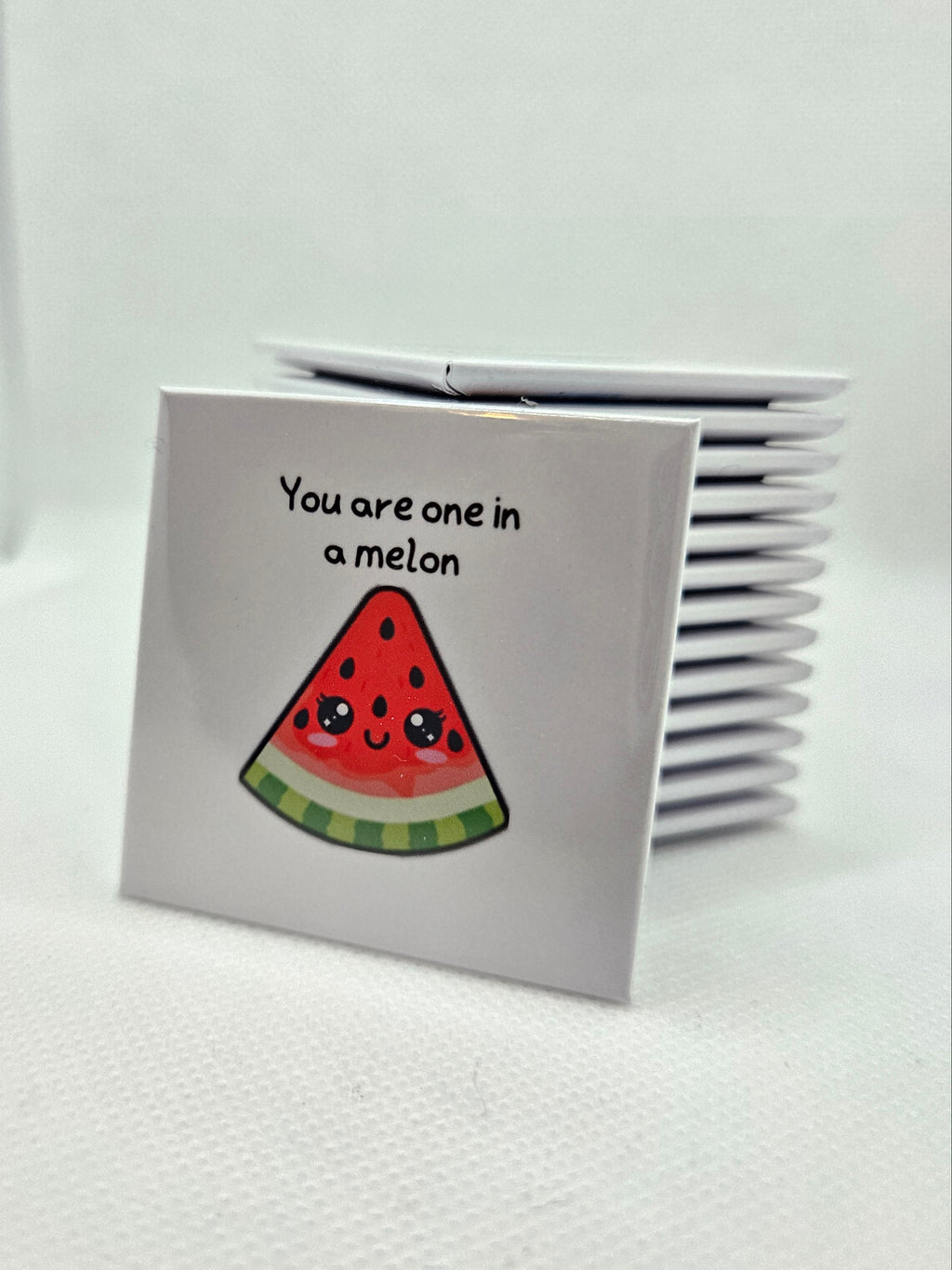 Magnet with watermelon design on a white background
